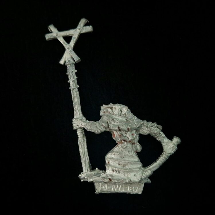 A photo of a Skaven Standard Bearer Warhammer miniature
