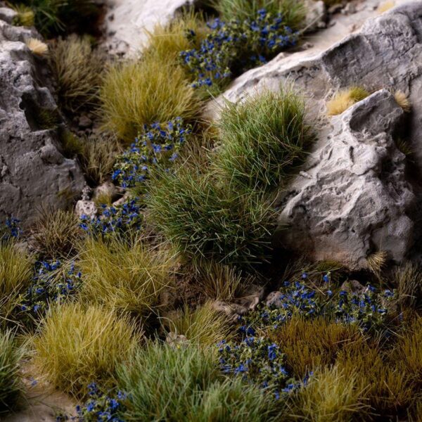 A photo of Gamers Grass Blue Flowers Tufts