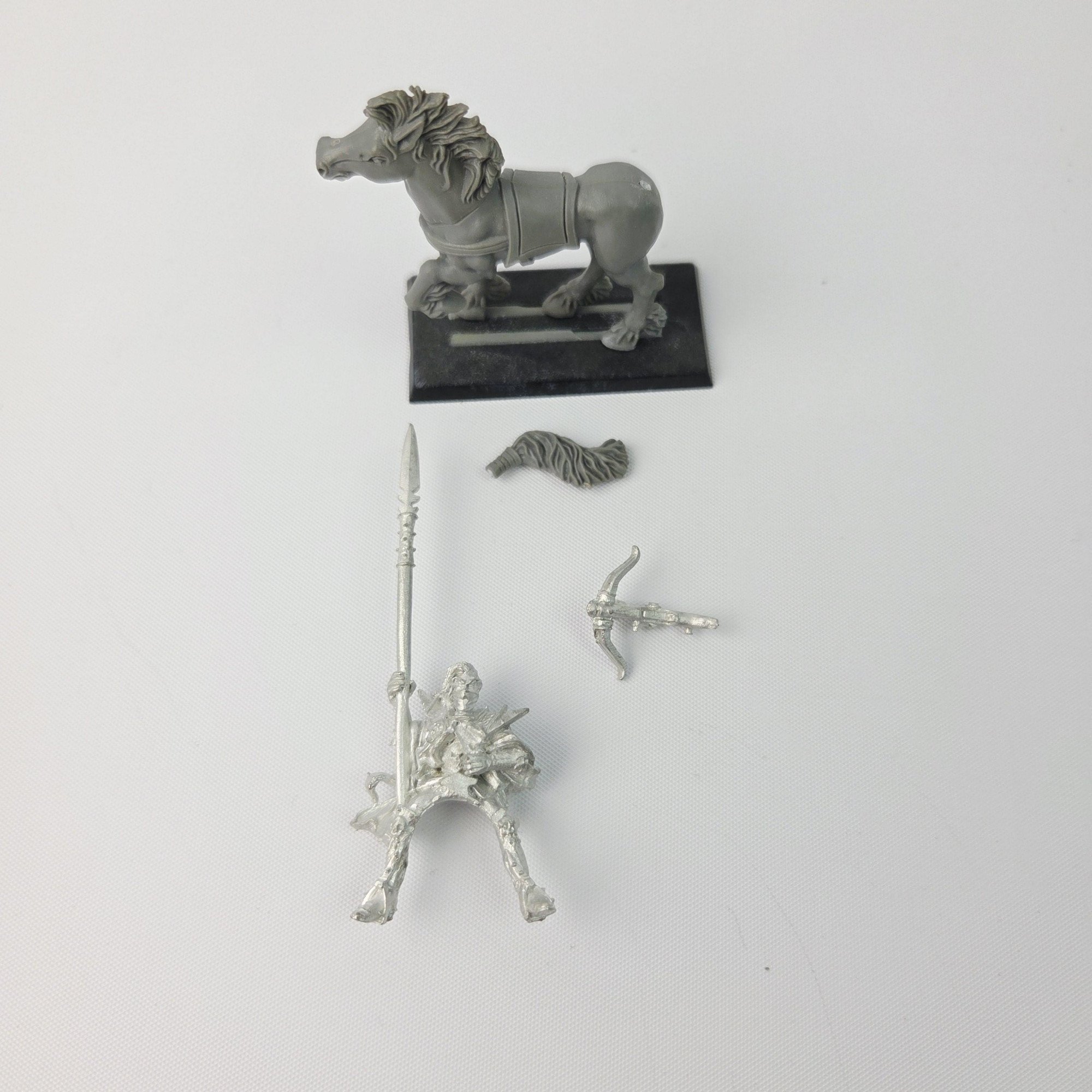 A photo of a Dark Elves Dark Rider Warhammer miniature