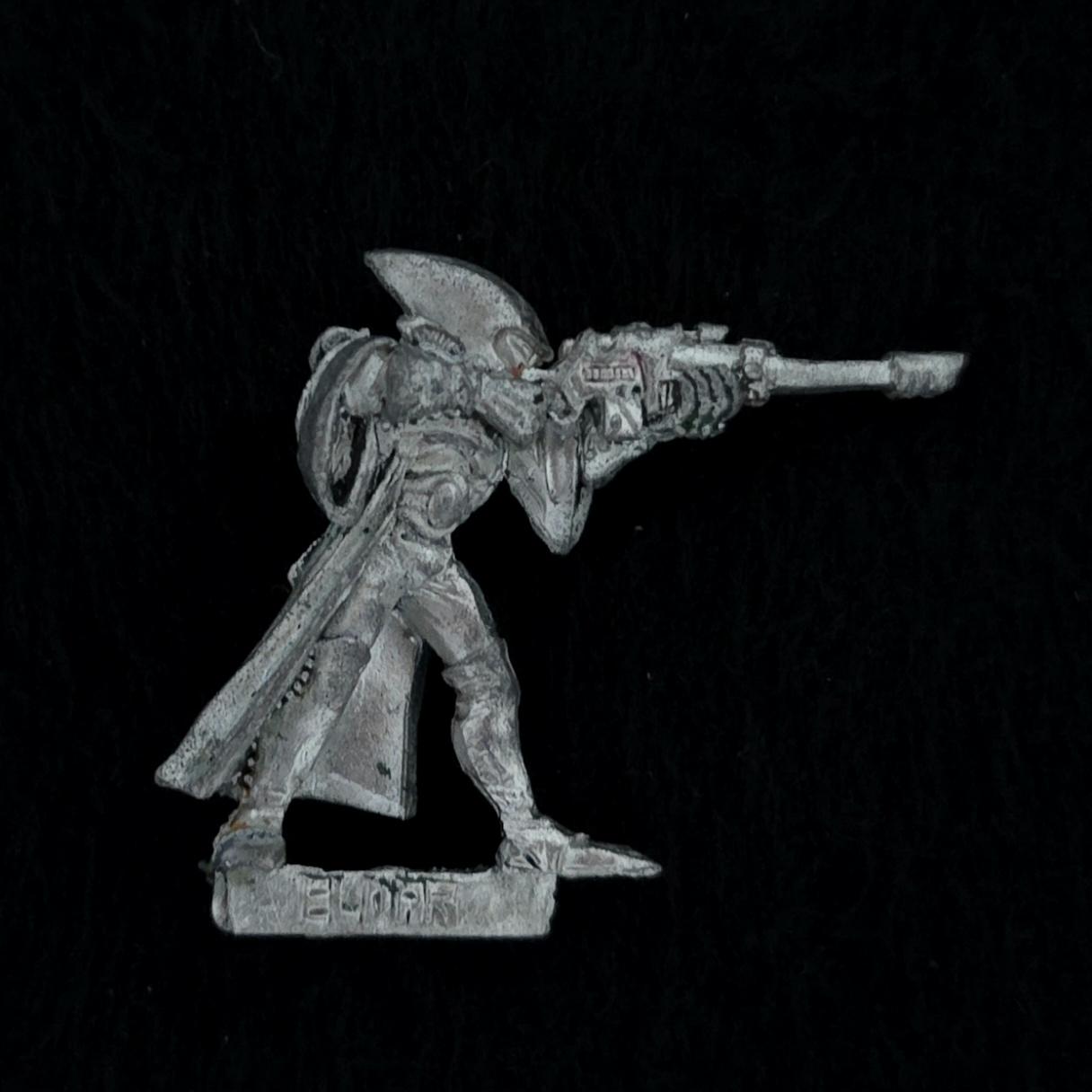 A photo of a Eldar Scout Warhammer miniature