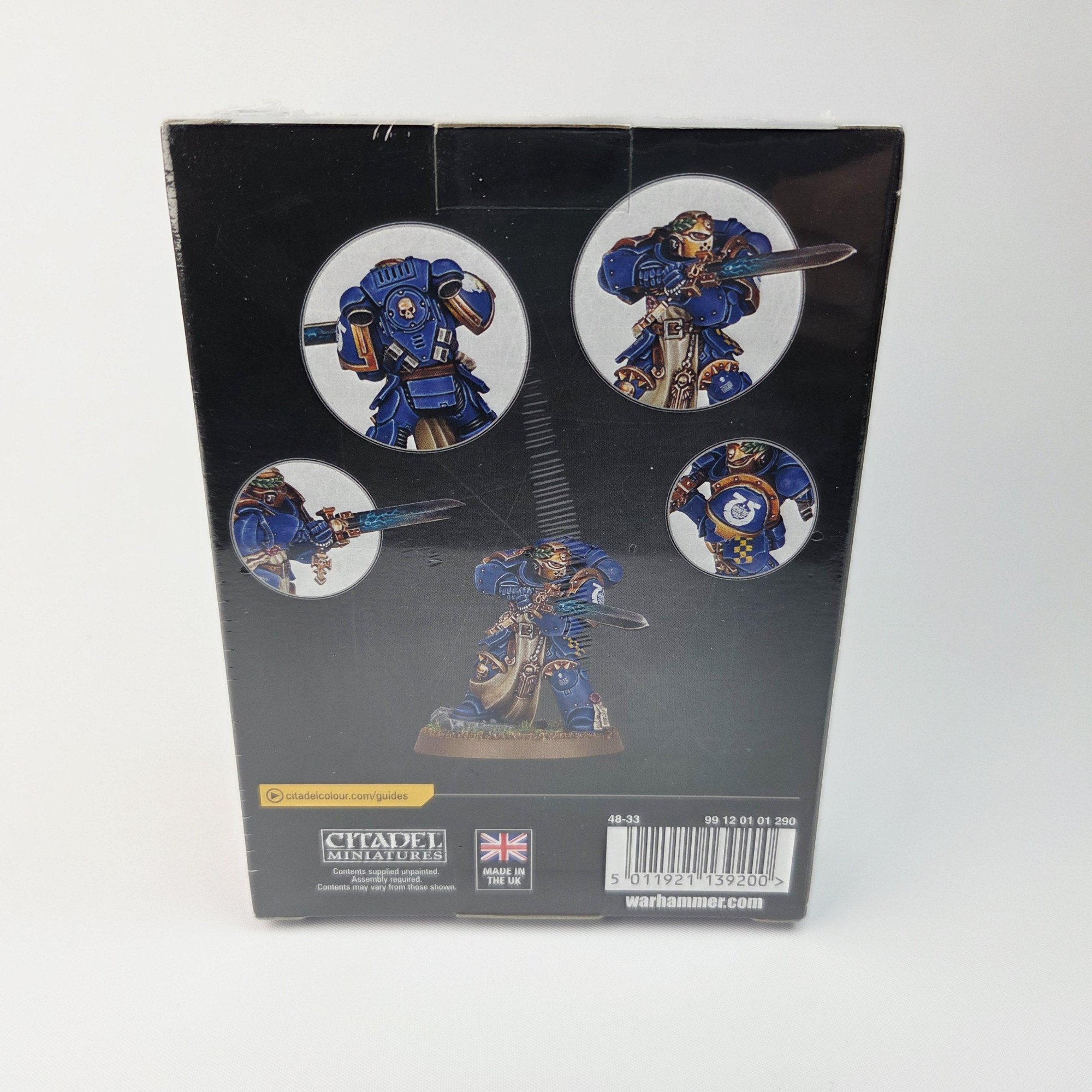 A photo of a Space Marines Commemorative Series Primaris Company Champion Warhammer miniature
