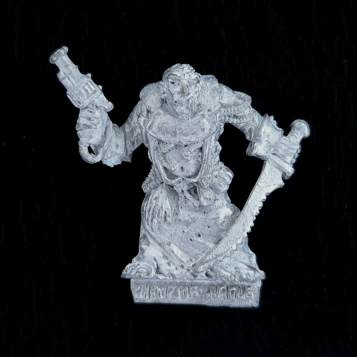 A photo of a Chaos Warriors Champion of Nurgle Warhammer miniature