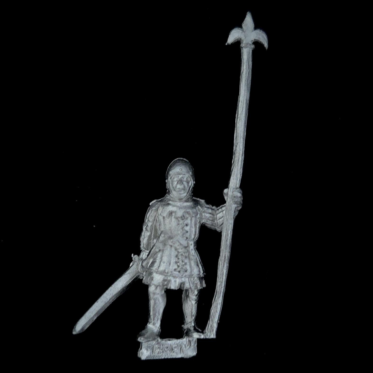 A photo of a Bretonnia Bowmen Standard Bearer Warhammer miniature