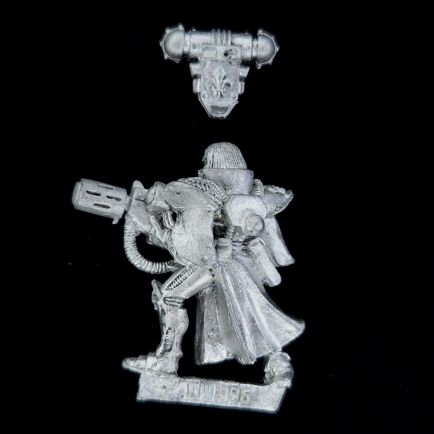 A photo of a Sisters of Battle Battle Sister with Melta Gun Warhammer miniature