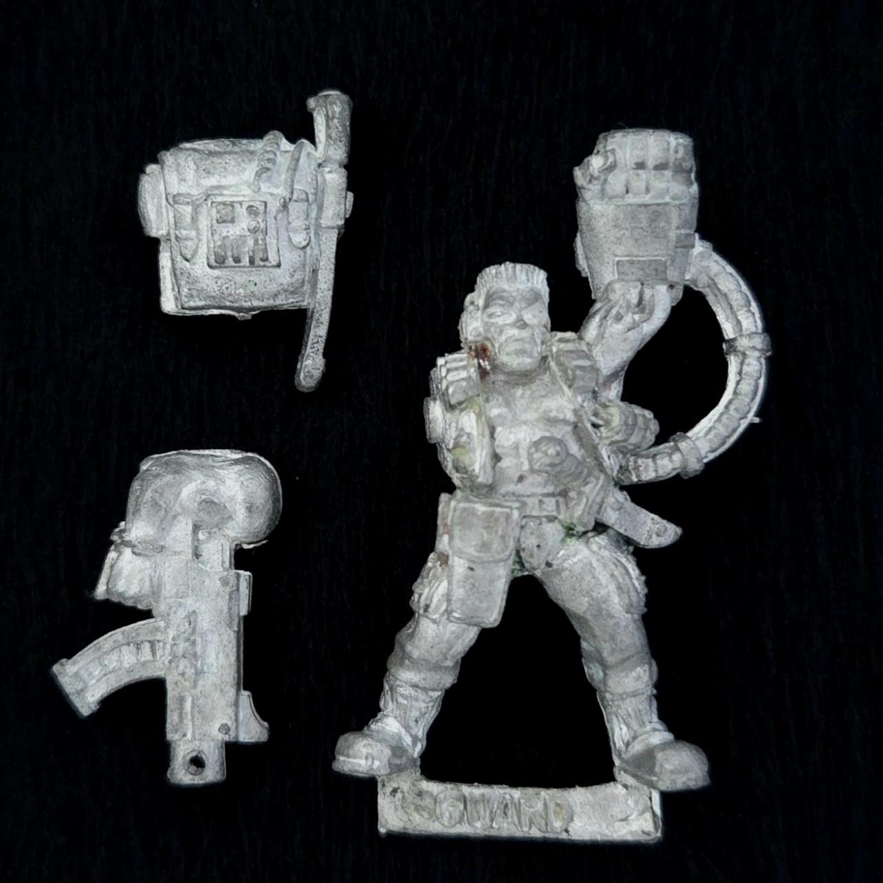 A photo of a Imperial Guard Catachan Jungle Fighters Captain Warhammer miniature