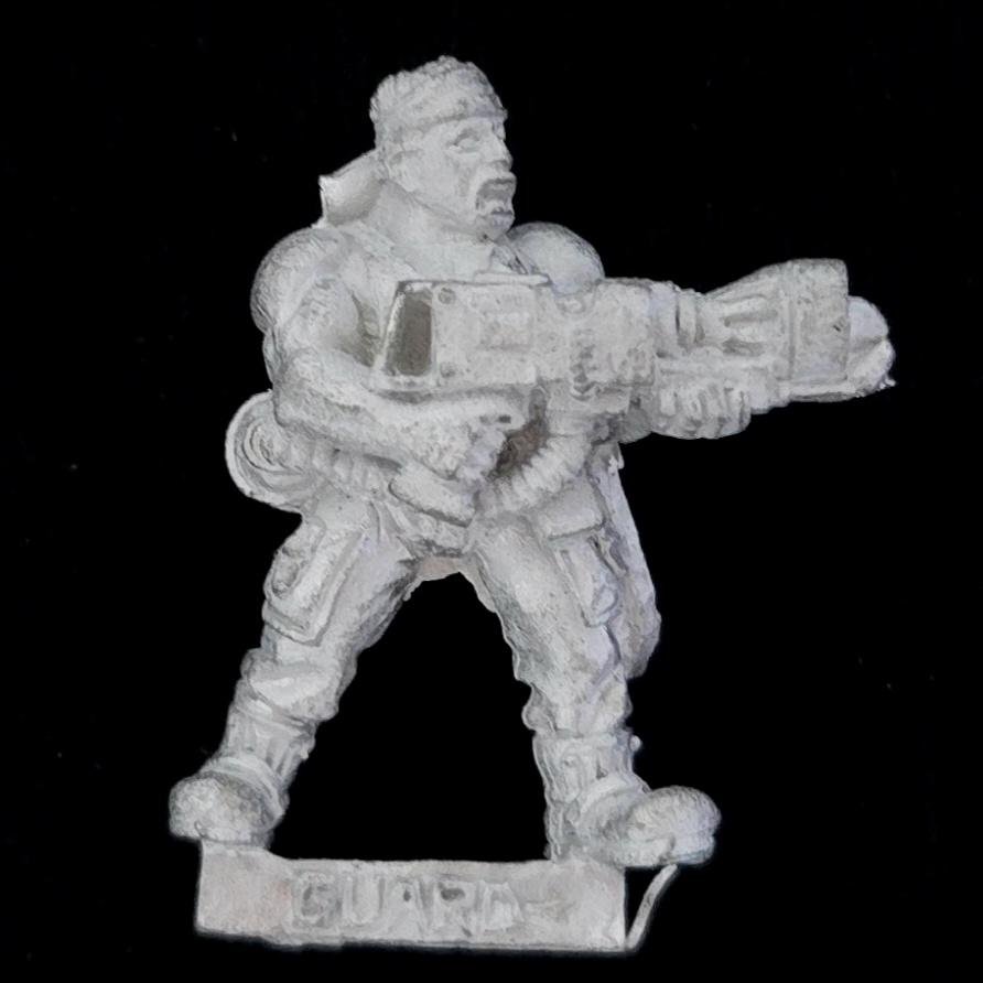 A photo of a Imperial Guard Catachan Jungle Fighters Flamer Warhammer miniature