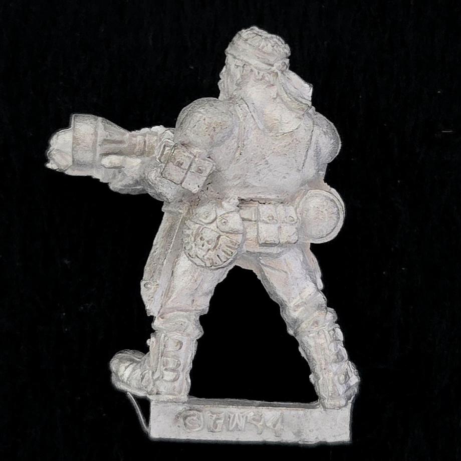 A photo of a Imperial Guard Catachan Jungle Fighters Flamer Warhammer miniature