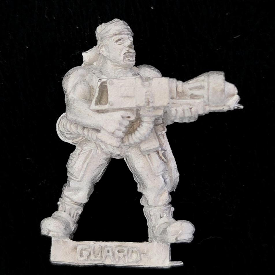 A photo of a Imperial Guard Catachan Jungle Fighters Flamer Warhammer miniature
