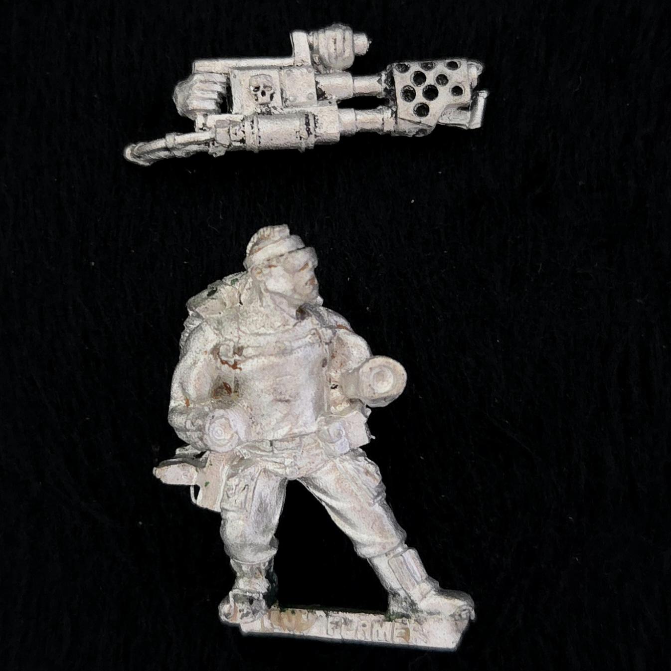 A photo of a Imperial Guard Catachan Jungle Fighters Heavy Flamer Warhammer miniature