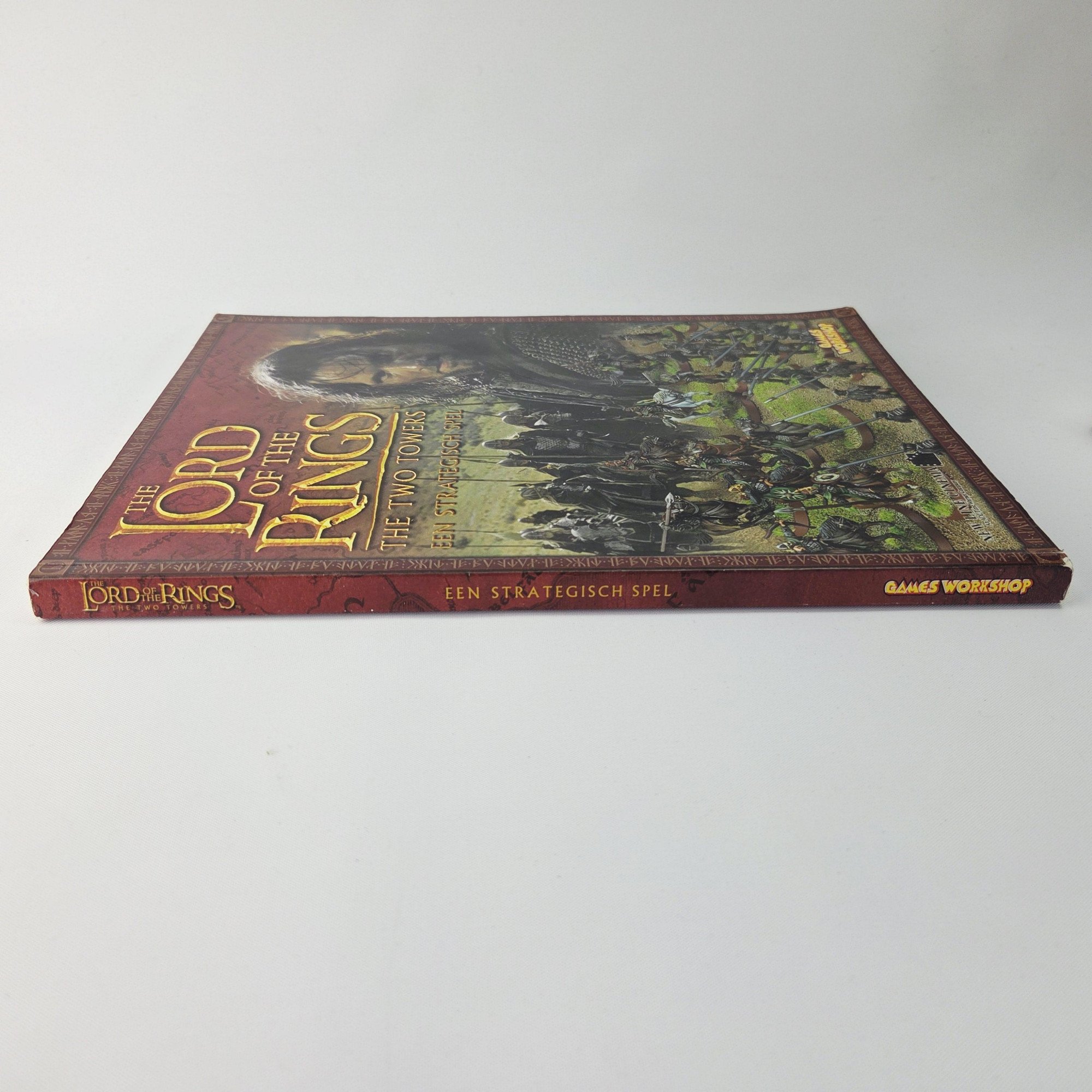 A photo of a The Lord of the Rings The Two Towers Rulebook