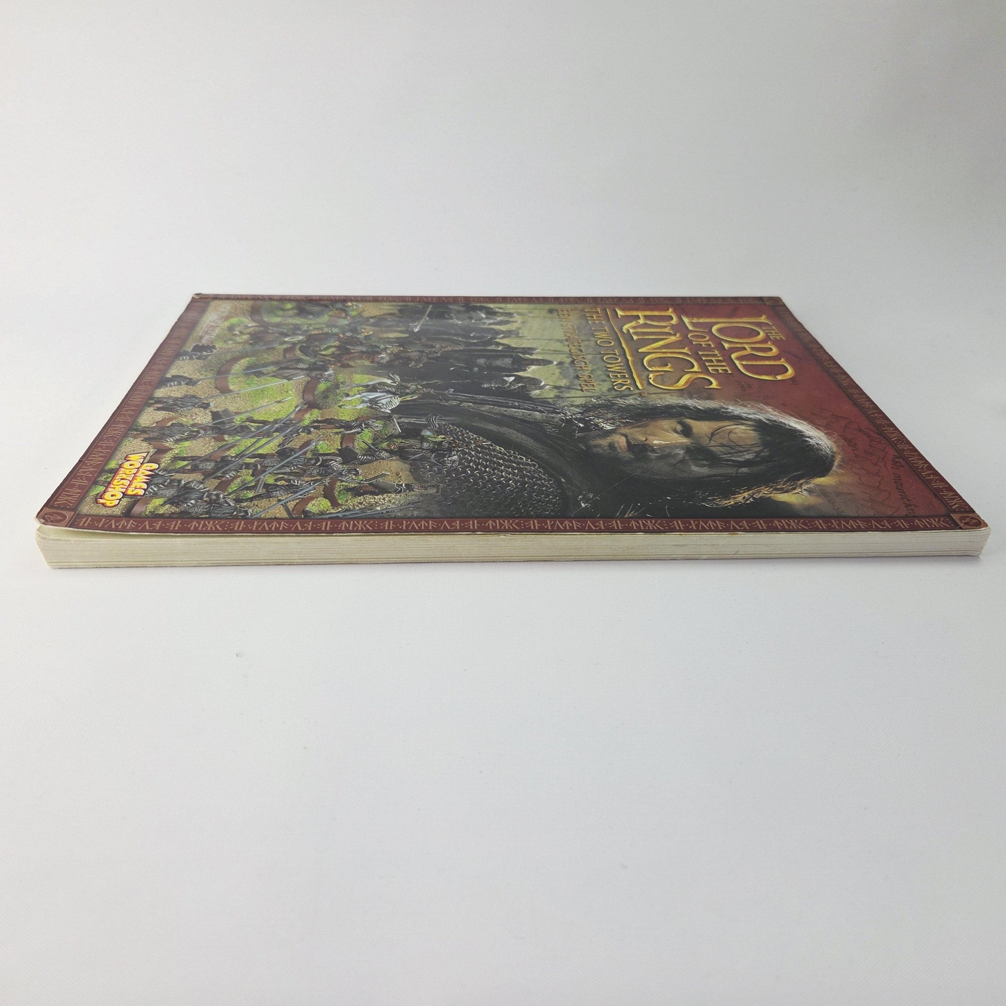 A photo of a The Lord of the Rings The Two Towers Rulebook