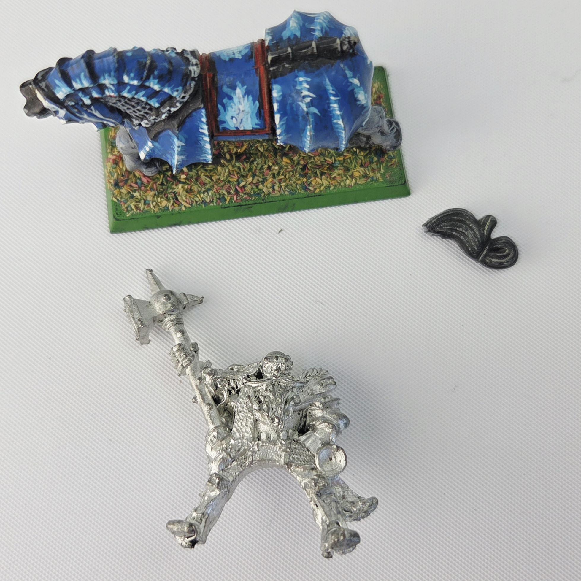 A photo of a The Empire Knights of the White Wolf Grandmaster Warhammer miniature