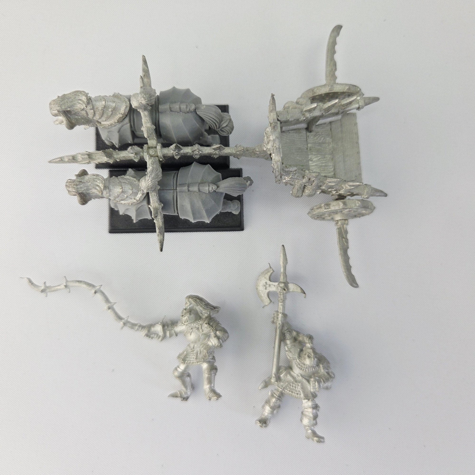 A photo of a Chaos Warriors Chariot Warhammer miniature