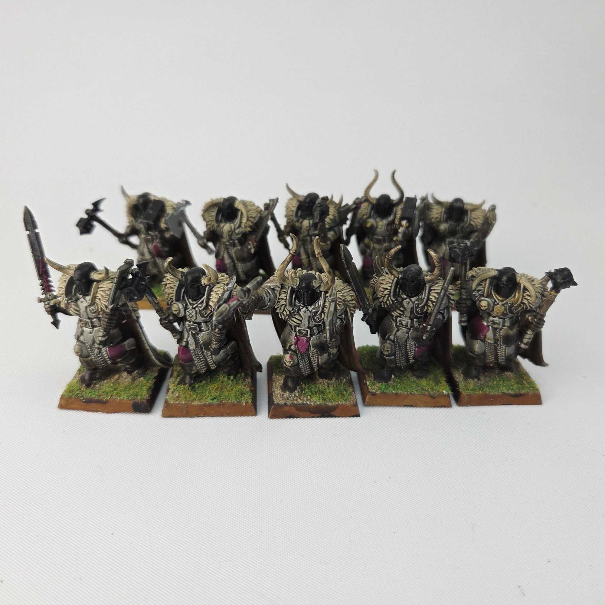 a photo of Chaos Warriors Warhammer miniatures