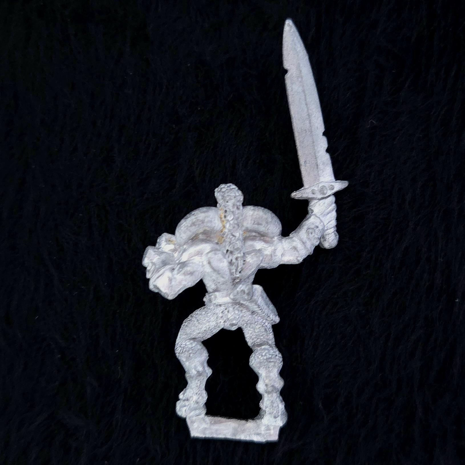A photo of a Beasts of Chaos Marauder Beastman Warhammer miniature