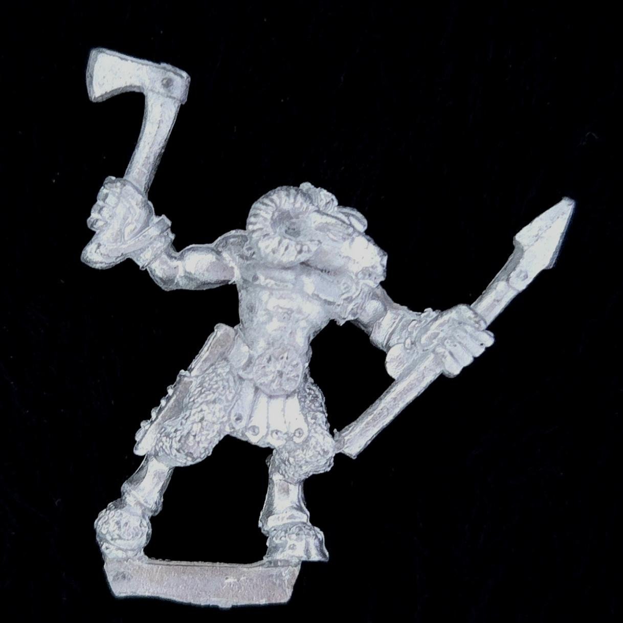 A photo of a Beasts of Chaos Marauder Beastman Warhammer miniature