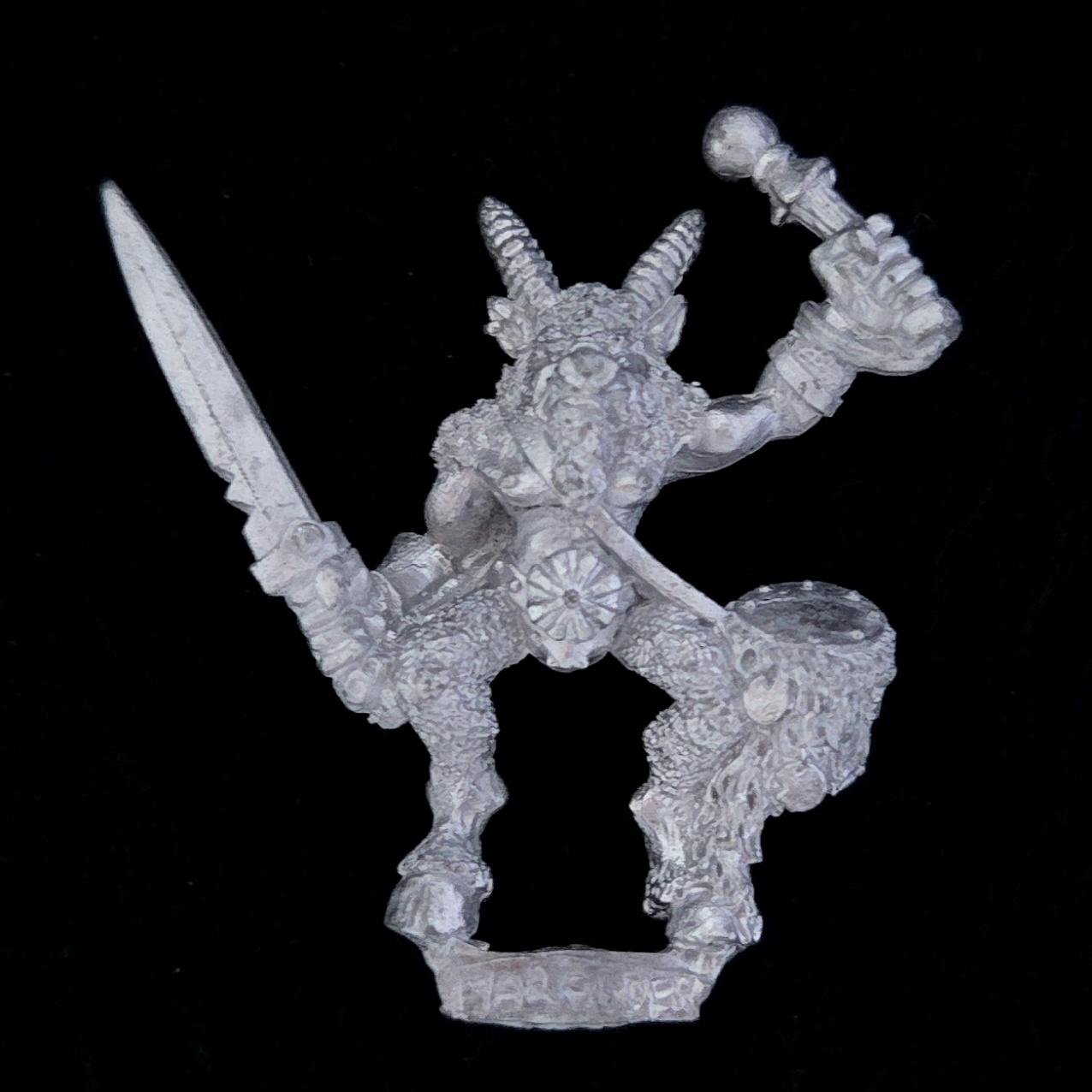 A photo of a Beasts of Chaos Marauder Beastmen Drummer Warhammer miniature