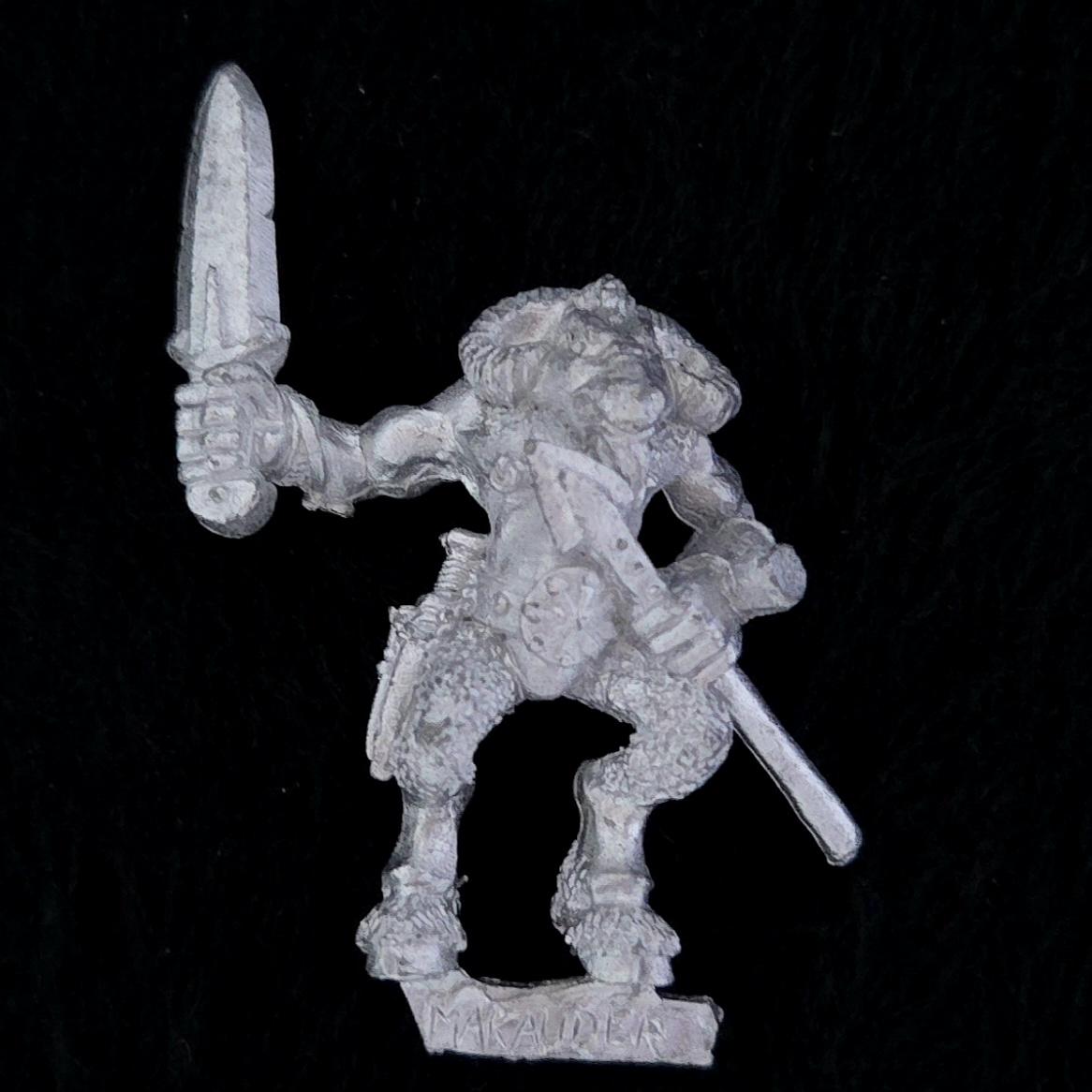 A photo of a Beasts of Chaos Marauder Beastman Warhammer miniature