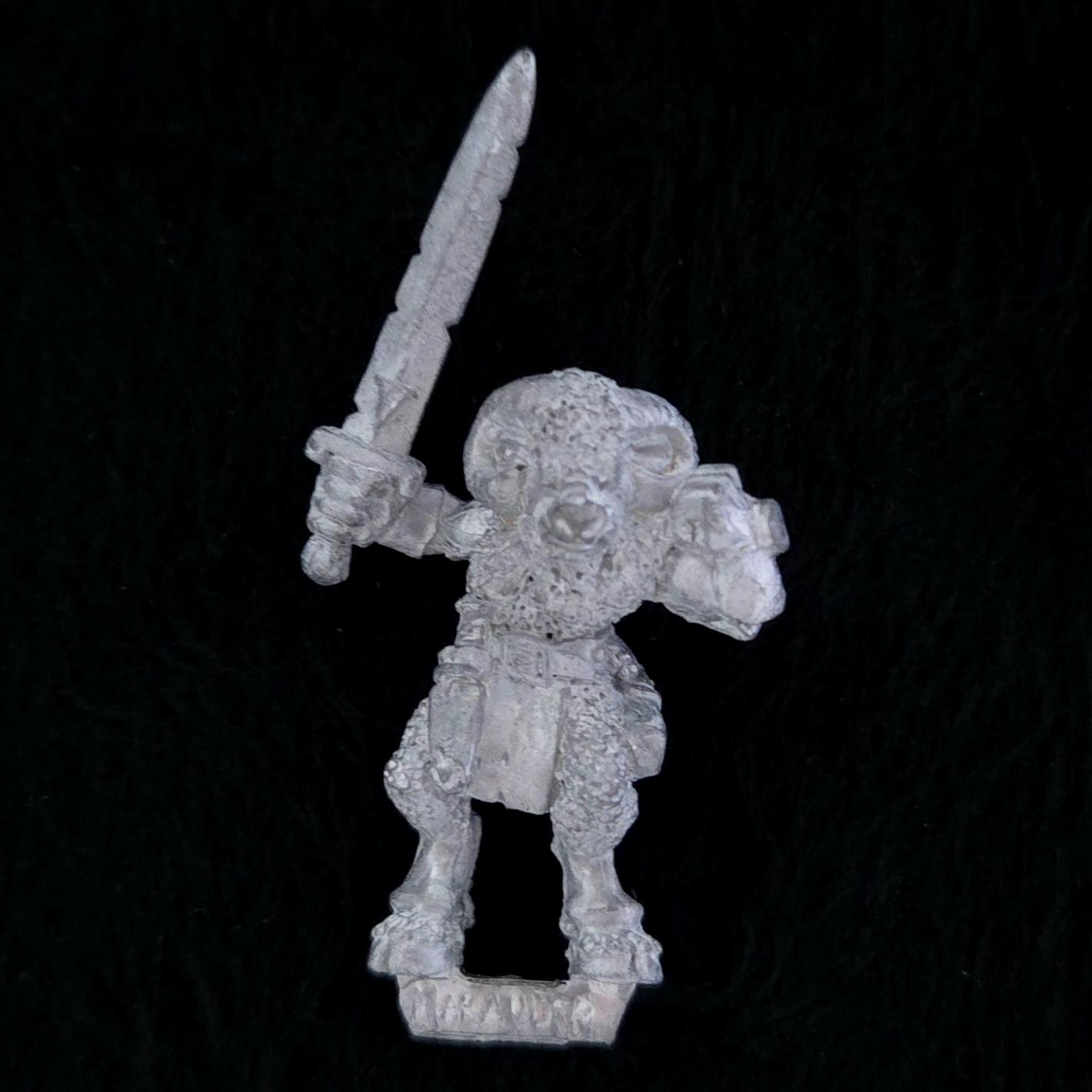 A photo of a Beasts of Chaos Marauder Beastman Warhammer miniature