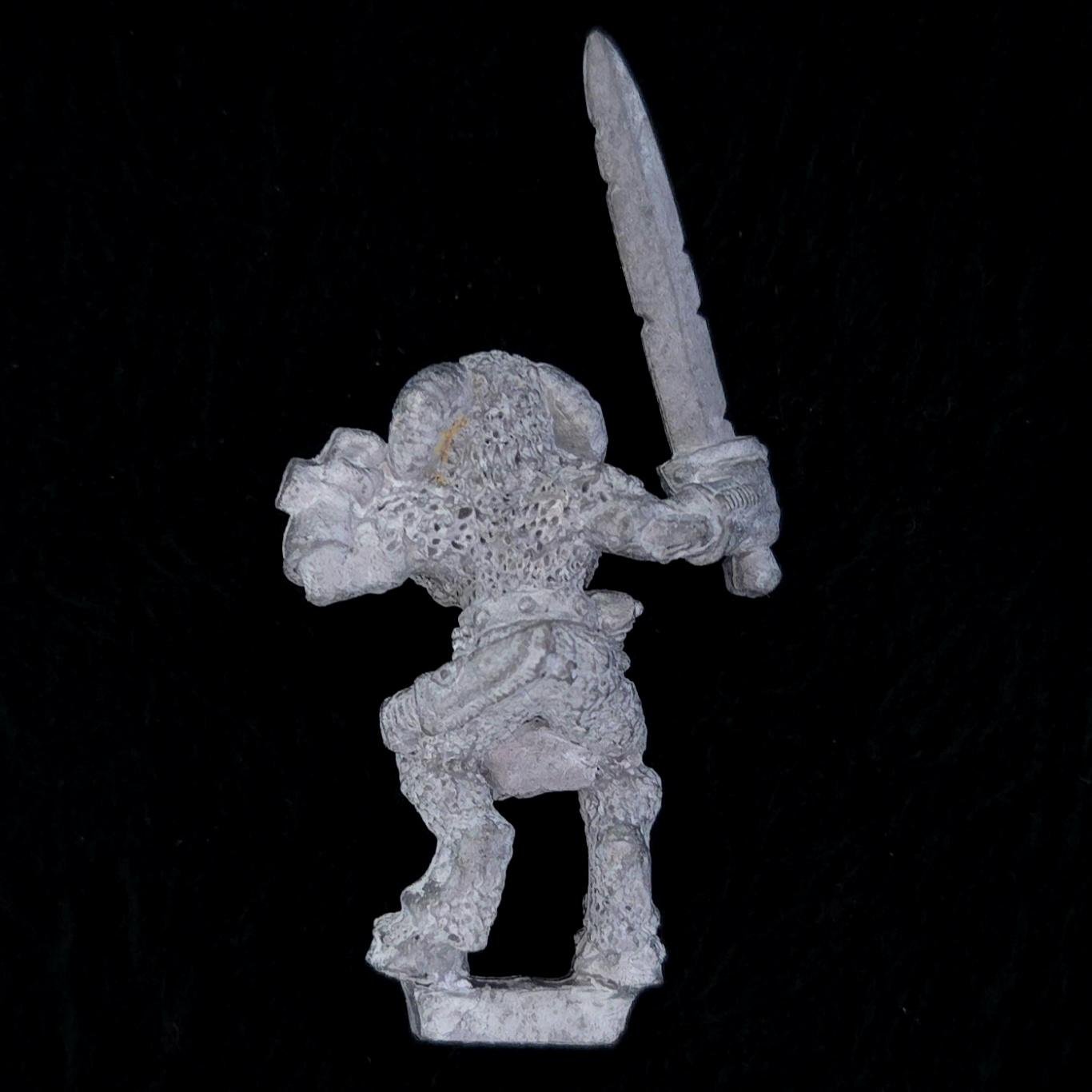 A photo of a Beasts of Chaos Marauder Beastman Warhammer miniature