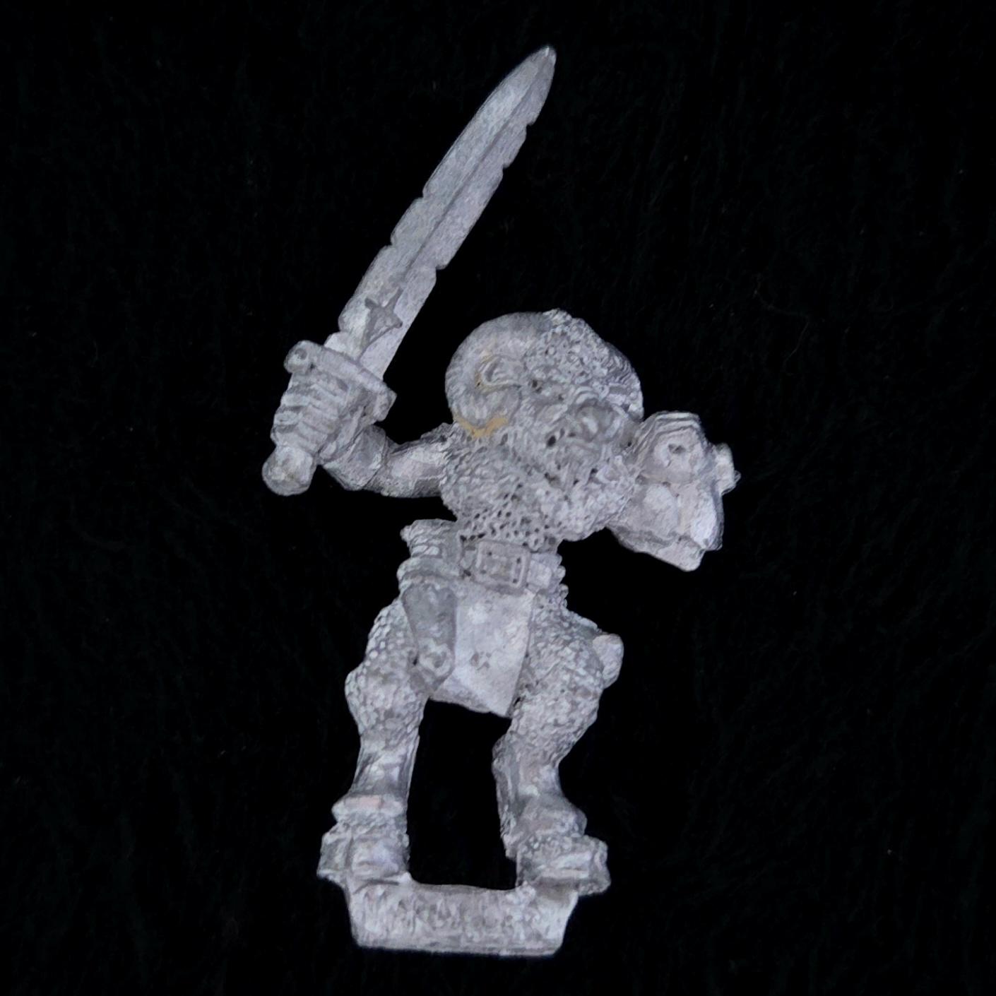 A photo of a Beasts of Chaos Marauder Beastman Warhammer miniature