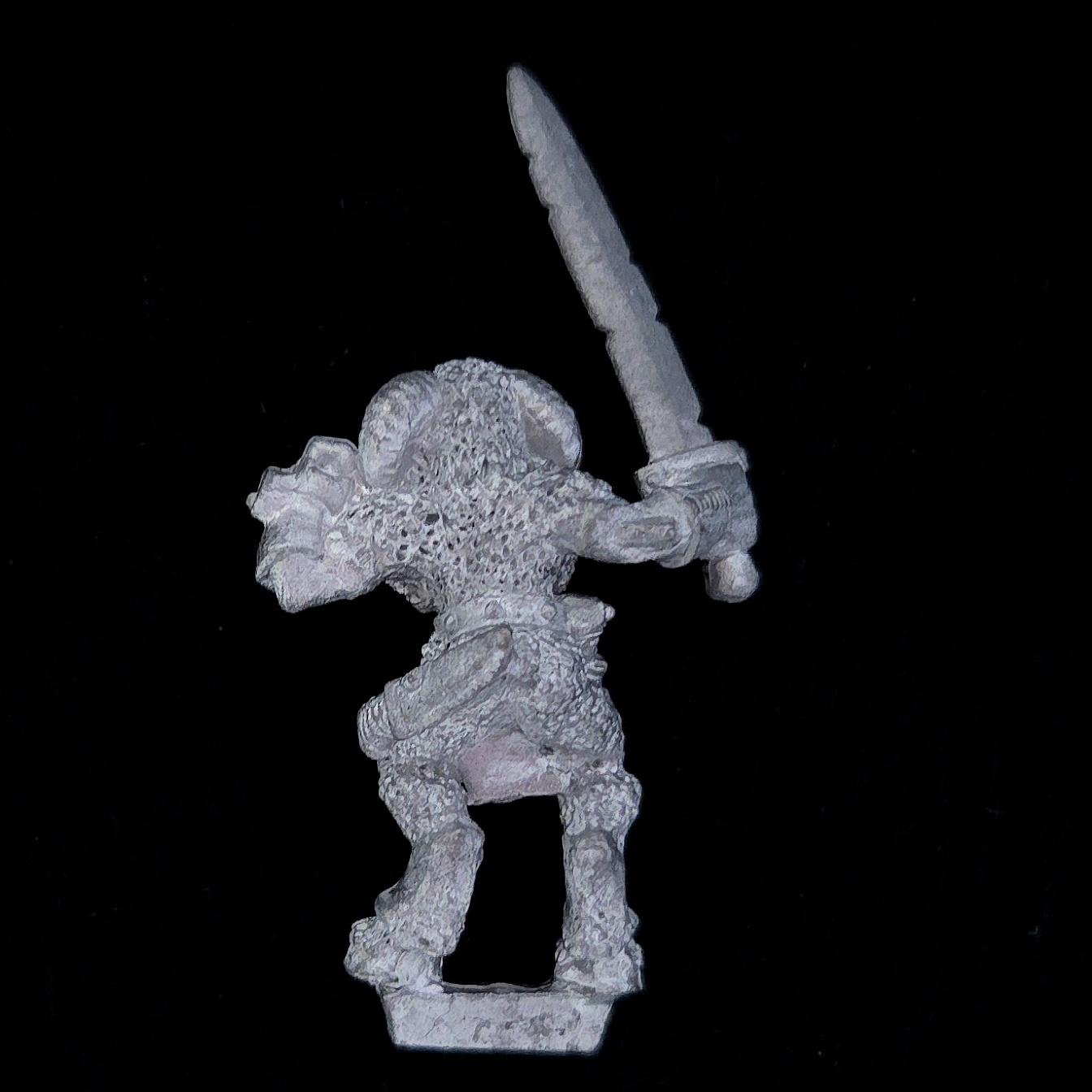 A photo of a Beasts of Chaos Marauder Beastman Warhammer miniature