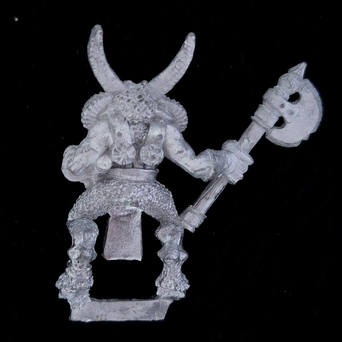 A photo of a Beasts of Chaos Marauder Beastman Warhammer miniature