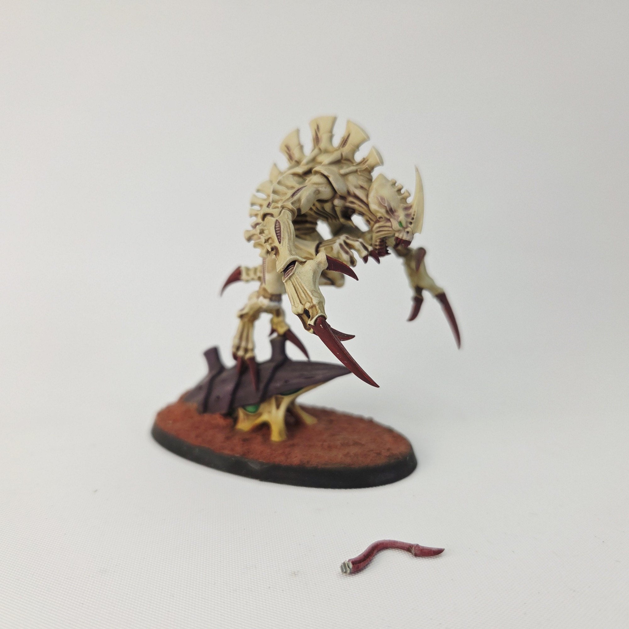 A photo of a Tyranid Broodlord Warhammer miniature