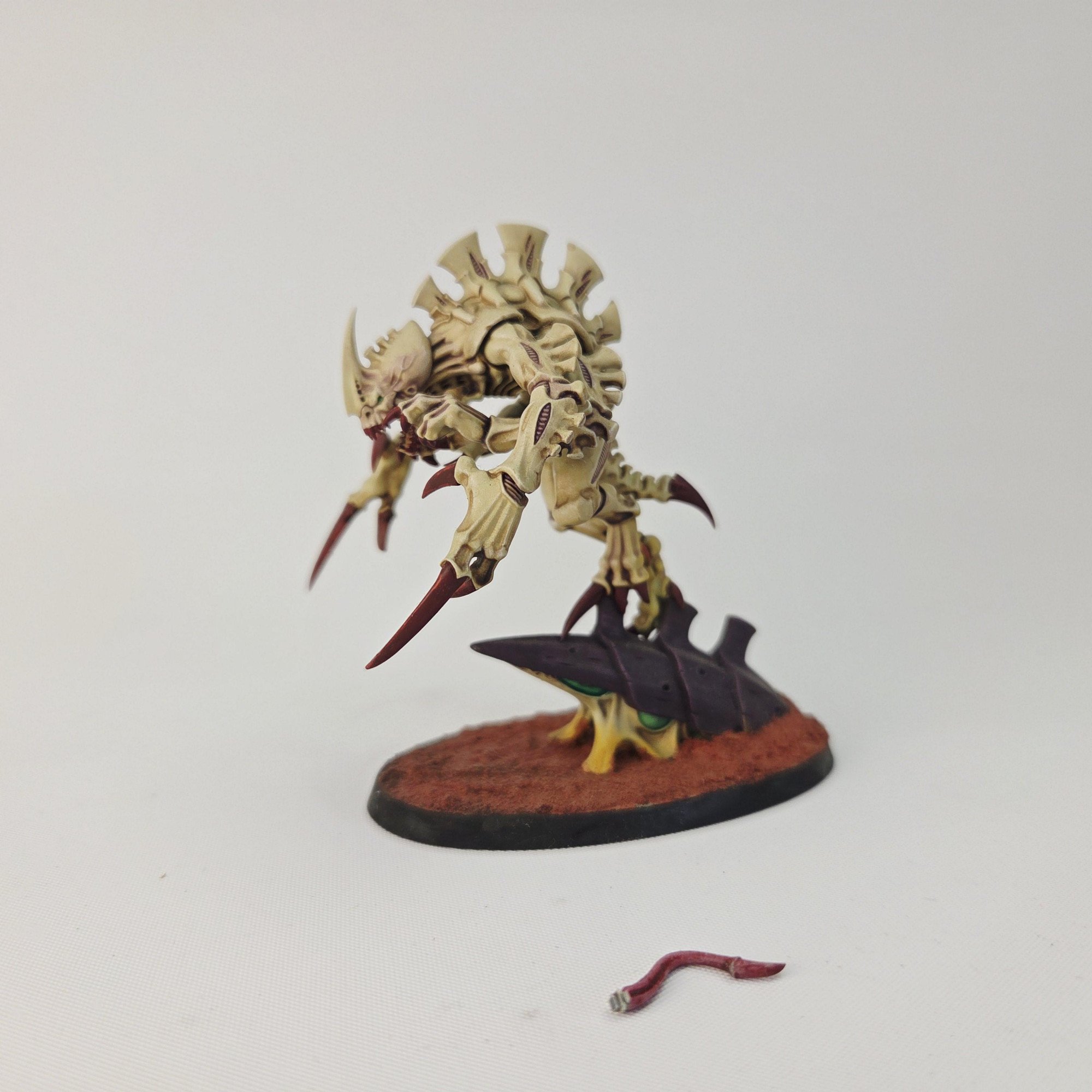 A photo of a Tyranid Broodlord Warhammer miniature