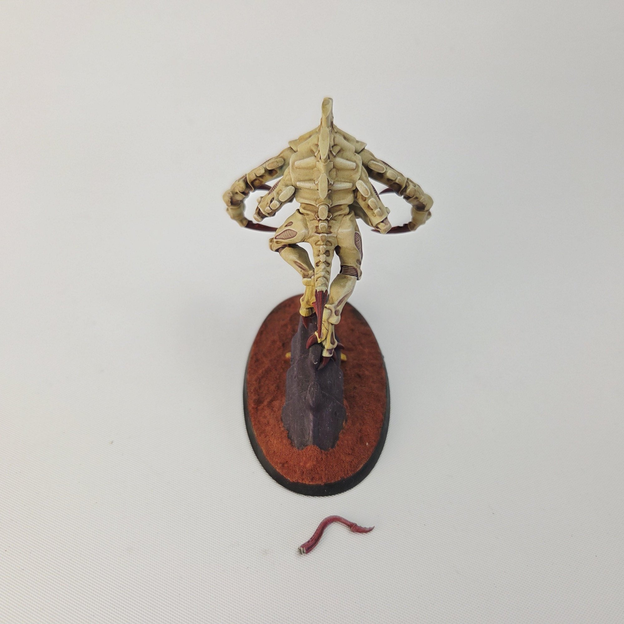 A photo of a Tyranid Broodlord Warhammer miniature