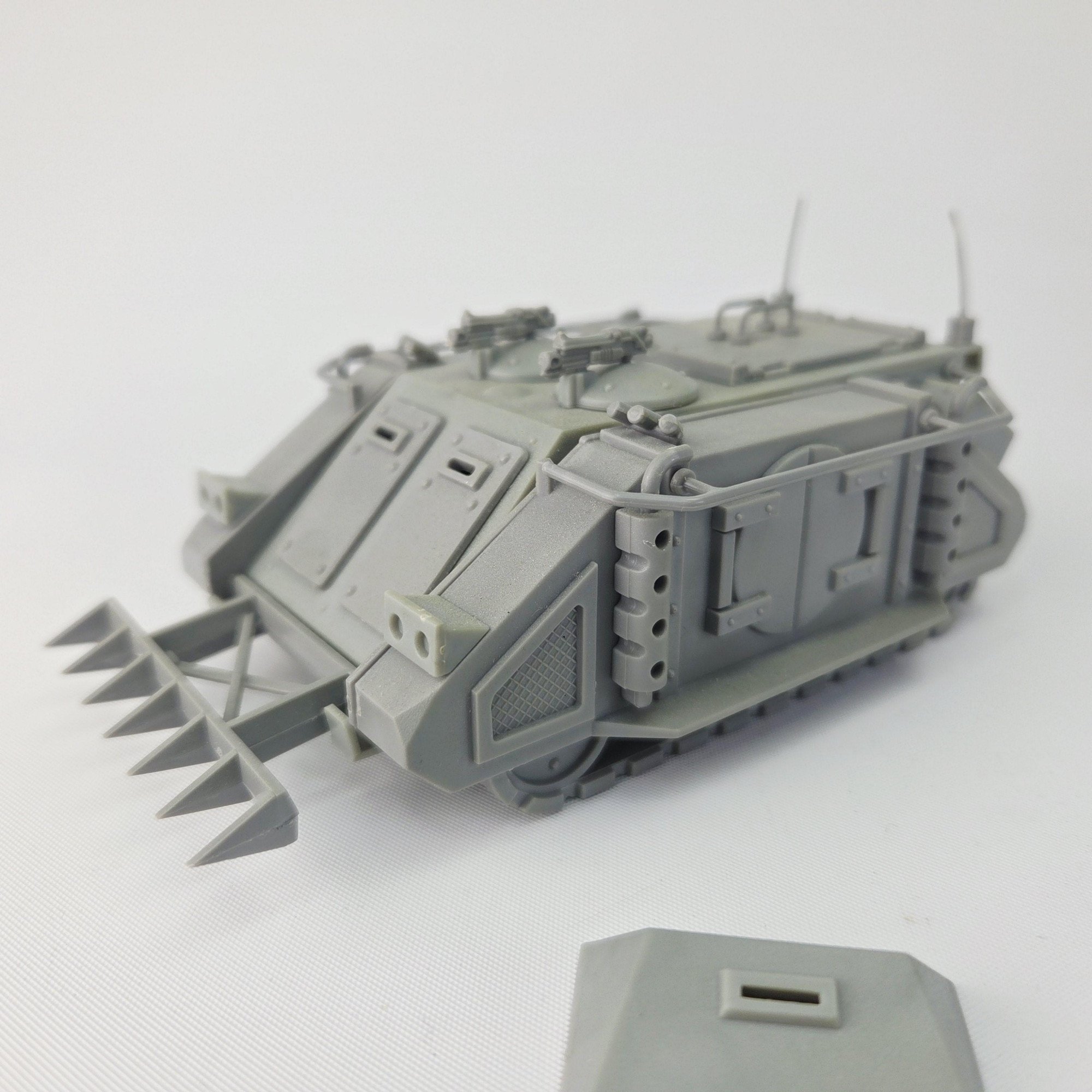 A photo of a Space Marines Rhino Warhammer miniature