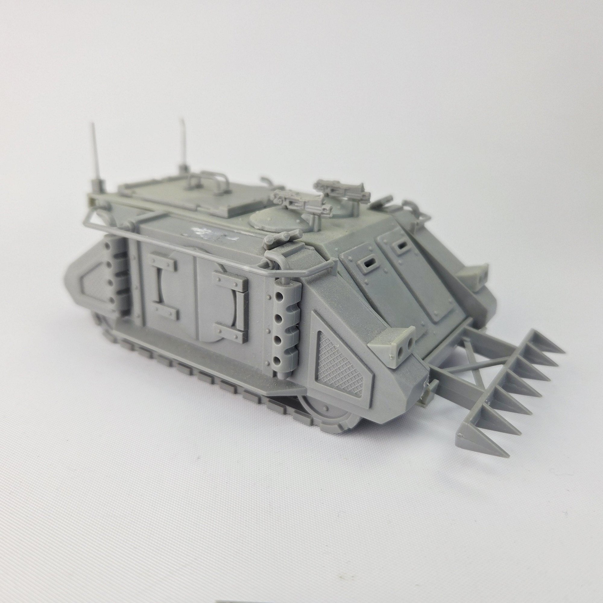 A photo of a Space Marines Rhino Warhammer miniature
