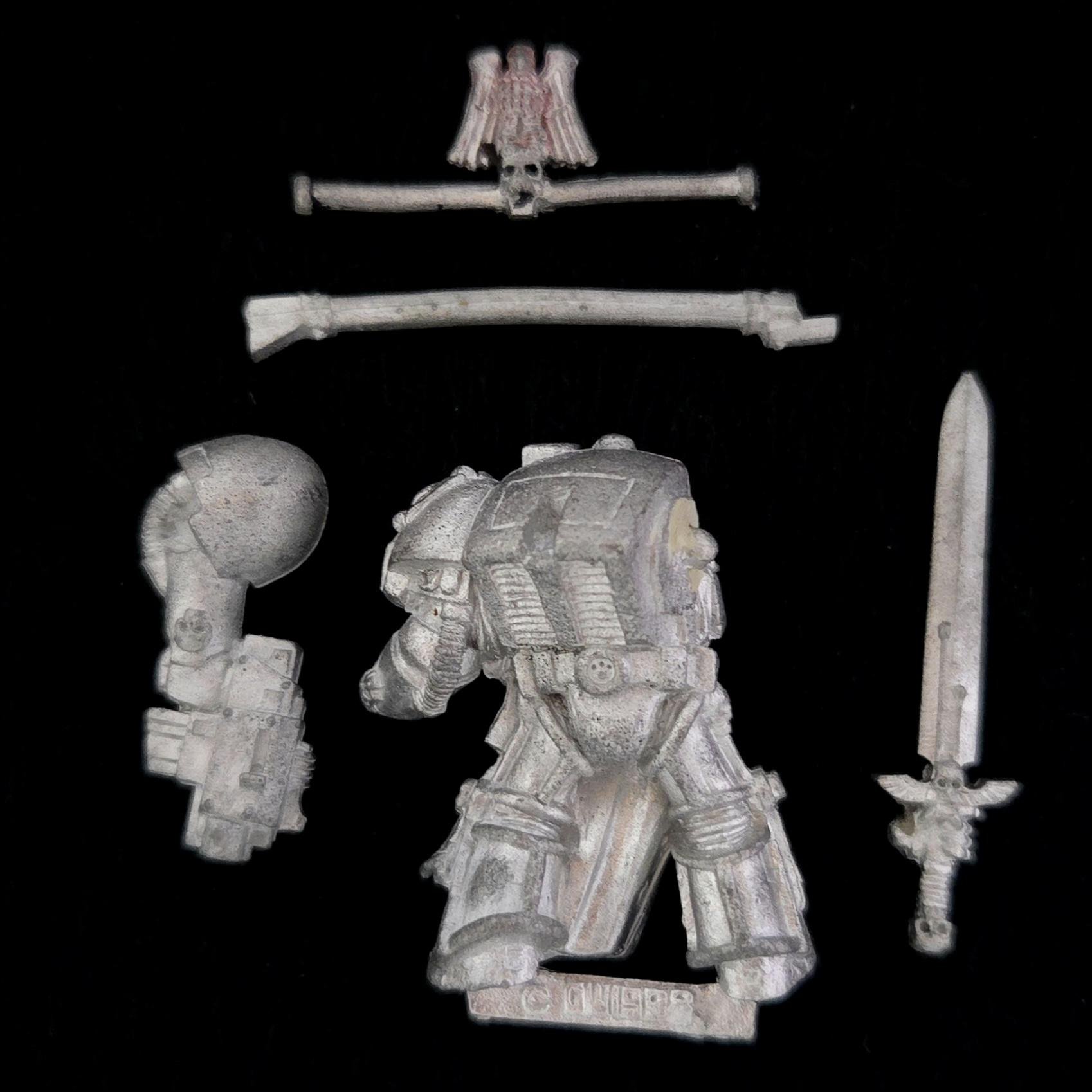 A photo of a Space Marines Captain in Terminator Armour Warhammer miniature