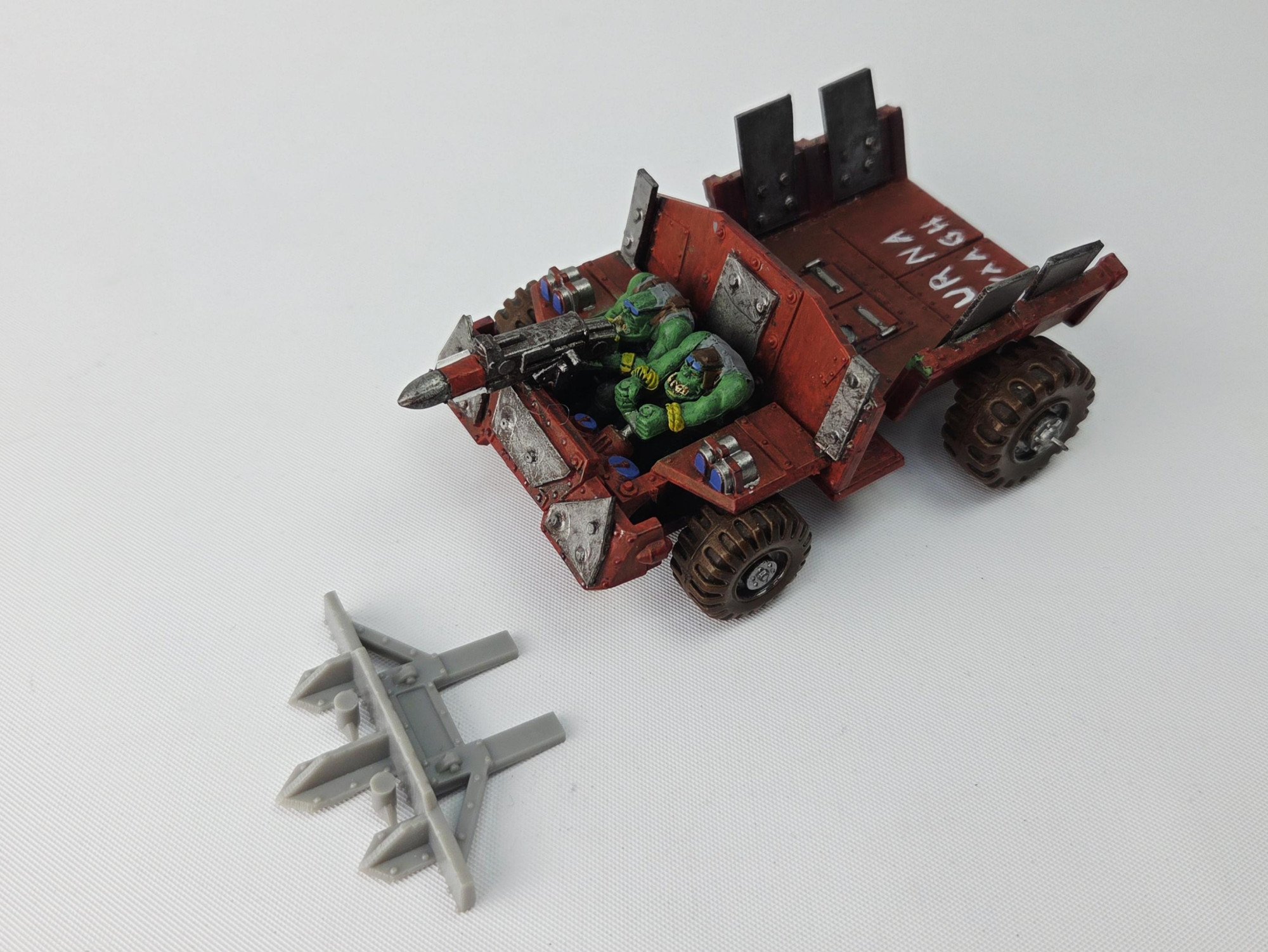 A photo of a Ork War Trukk Warhammer miniature