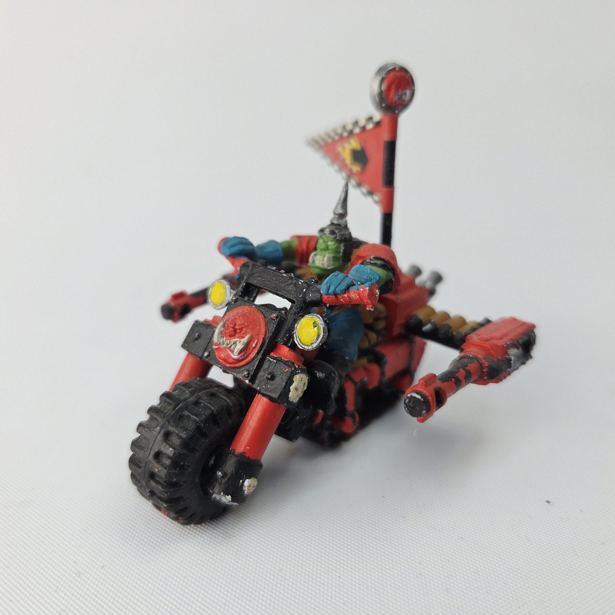 A photo of a Ork Warbike Warhammer miniature