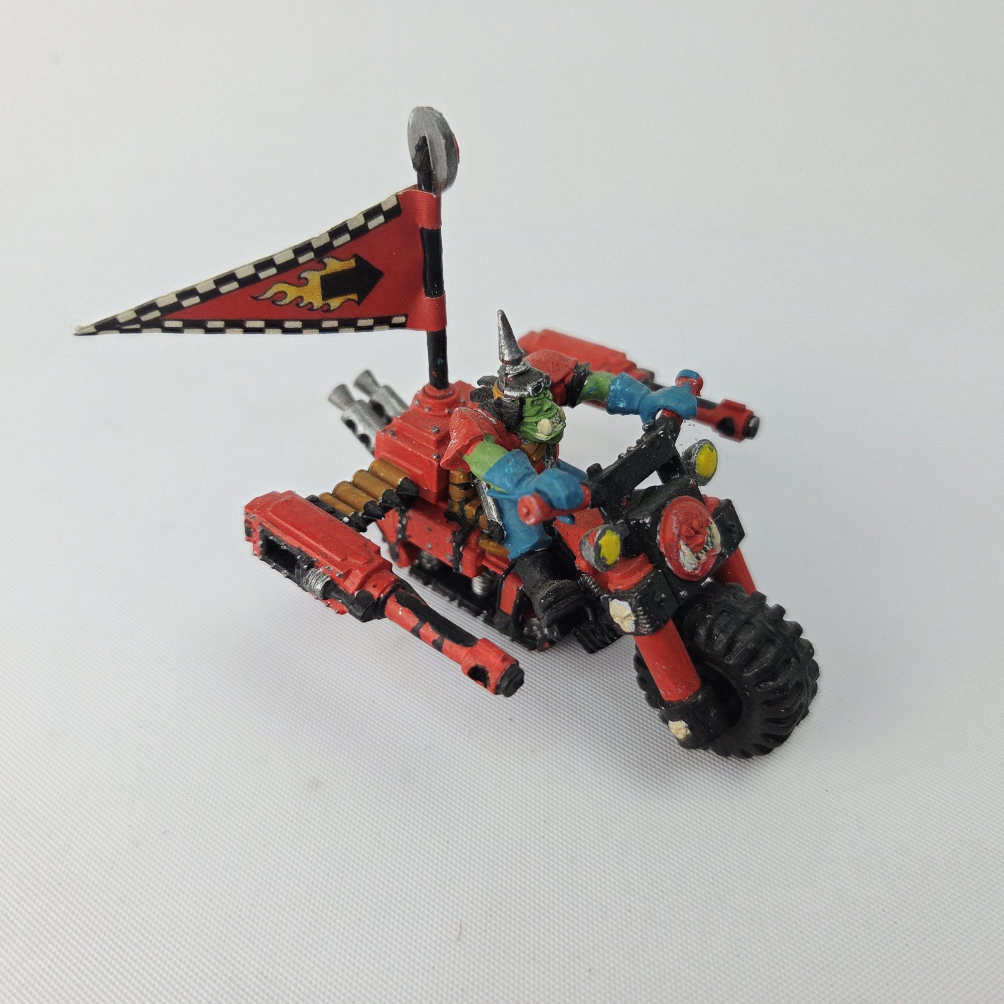 A photo of a Ork Warbike Warhammer miniature