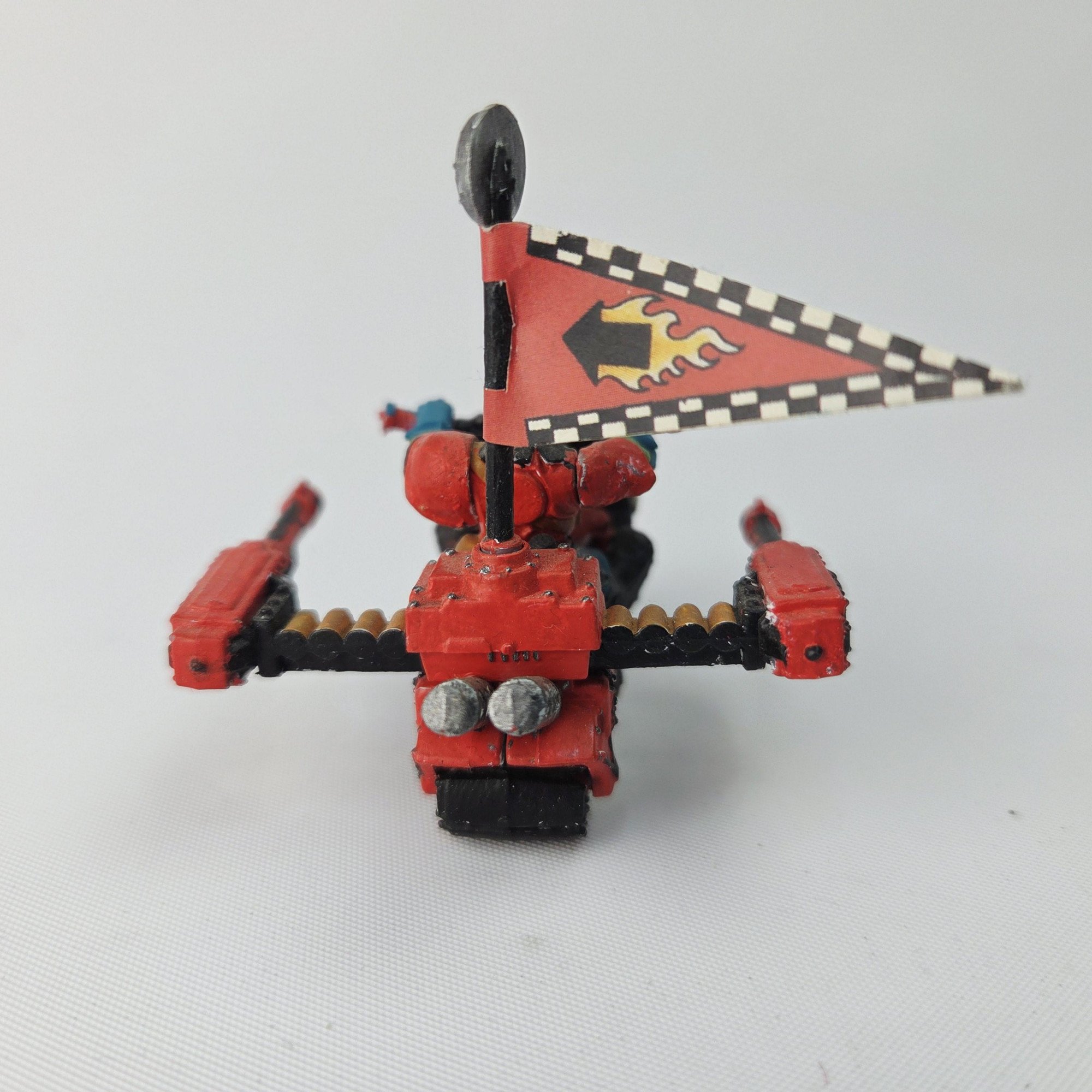 A photo of a Ork Warbike Warhammer miniature
