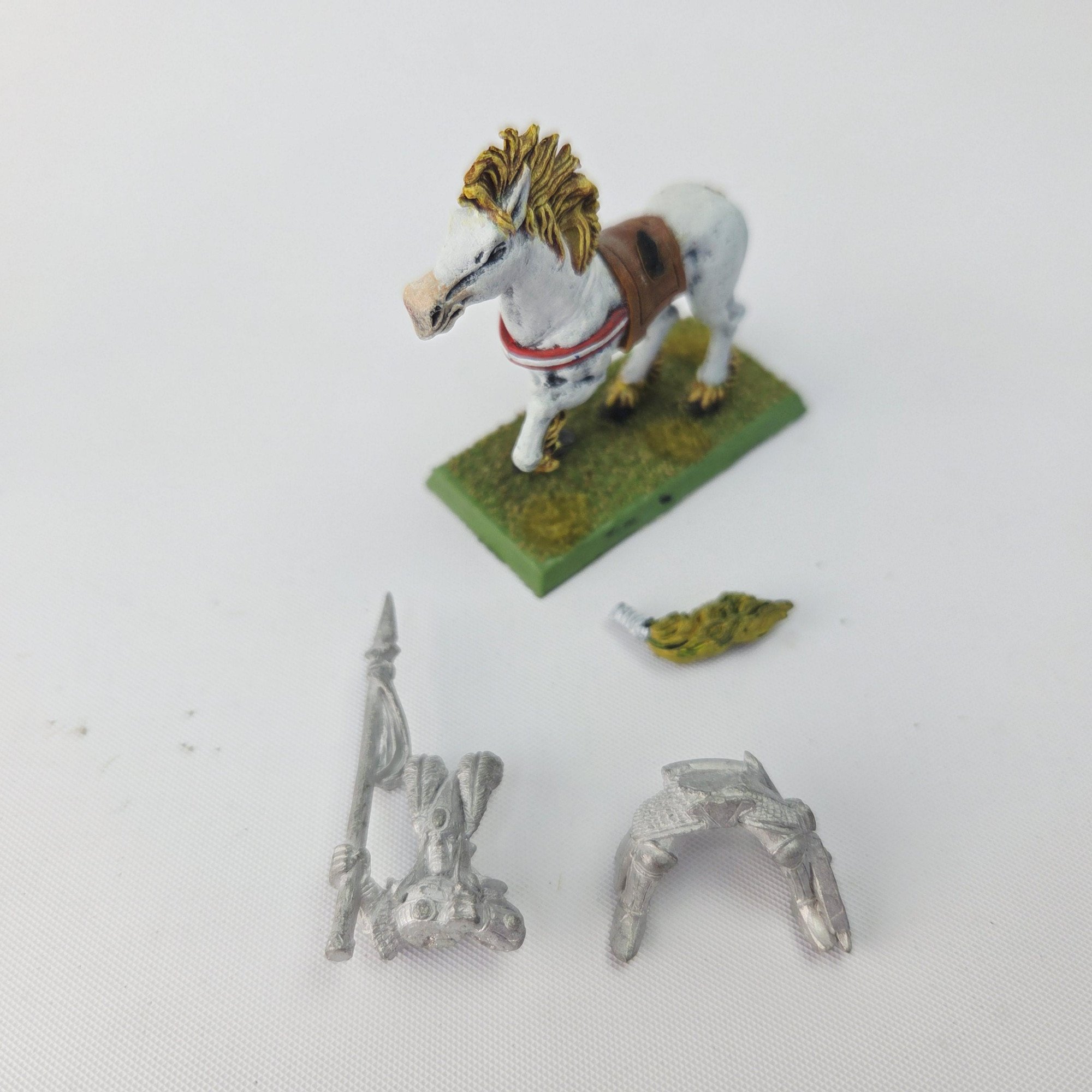 A photo of a High Elves Reaver Knight Warhammer miniature