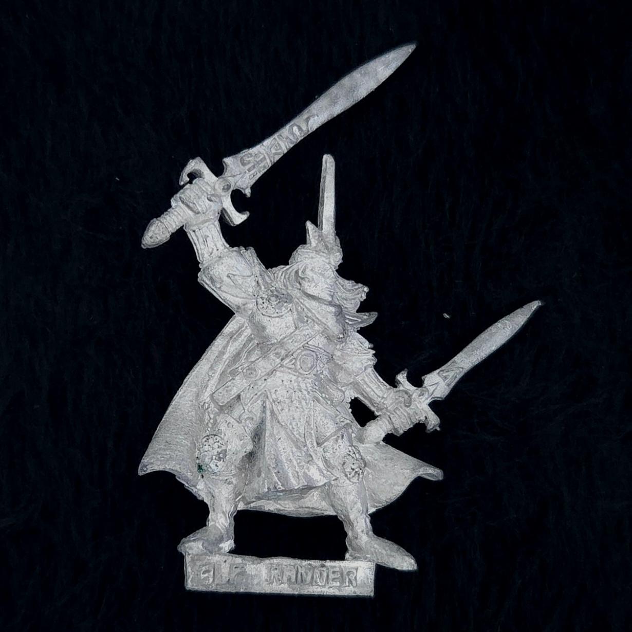 A photo of a Warhammer Quest Elf Ranger Warhammer miniature